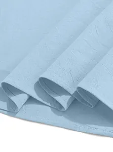 Close-up of breathable light blue cotton linen fabric texture on men's casual shirt hem