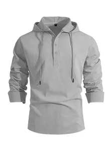 Detailed view of the button-down collar and texture of the grey linen hooded shirt