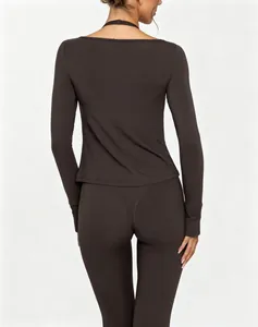 Back view of chocolate brown high-elastic long-sleeve yoga top and matching leggings for fitness