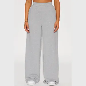 Close-up view of women's minimalist grey high-waist fleece wide-leg sweatpants for winter