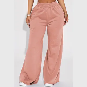 Close-up detail of women's dusty rose fleece wide-leg pants with comfortable elastic waist