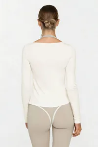 Back view of high-elastic long-sleeve yoga top featuring strap detail and soft V-neck.