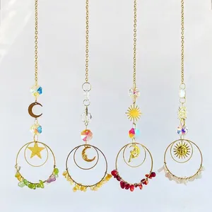 Crystal suncatcher hanging ornament with gold metal frame and colorful crushed stones.