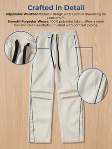 Detailansicht cremefarbene Techwear-Hose mit verstellbarem Bund und Polyestergewebe-Textur.