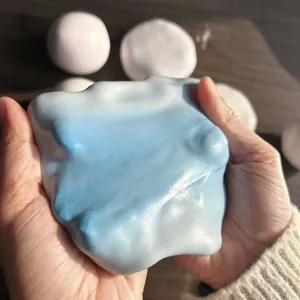 Jouet mochi mou pressable en dégradé bleu et blanc pour soulager le stress lent