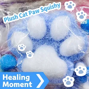 Detail view of the soft blue and white flocked cat paw TPR slow rebound squishy toy