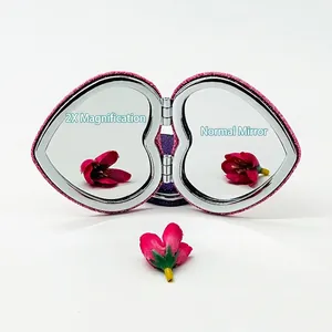 Portable heart-shaped folding double-sided makeup mirror with pink glitter cover