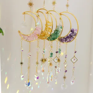 Handmade moon suncatcher with natural crystal stones, stars, and hanging prisms