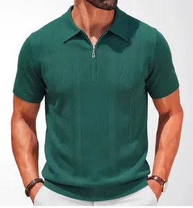 Close-up detail of dark green men's knit polo shirt with vertical texture and zipper