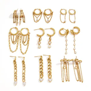 Collection of nine pairs of gold-plated titanium steel earrings with zircons and tassels