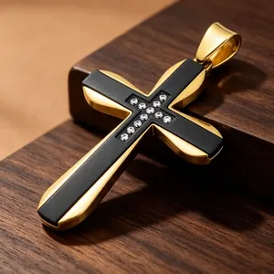 Close-up of hip-hop cross pendant with black inlay and crystals on wood