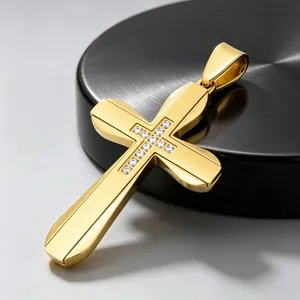 Detailed view of a gold stainless steel hip-hop cross pendant with inlaid diamonds