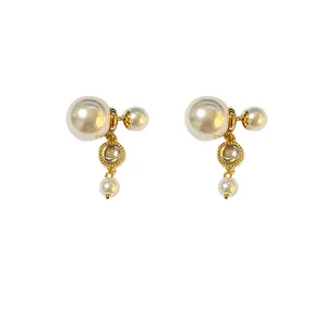 Elegante französische doppelseitige Perlenohrstecker mit goldenen Akzenten für Damen.