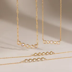 Detailed display of gold-plated stainless steel necklaces featuring various geometric zircon shapes