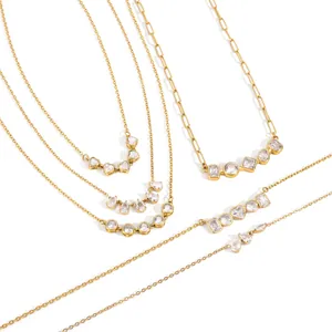 18k gold plated stainless steel geometric cubic zirconia necklace and bracelet jewelry set.