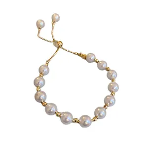 Elegant French vintage pearl bracelet with gold beads and adjustable slider closure
