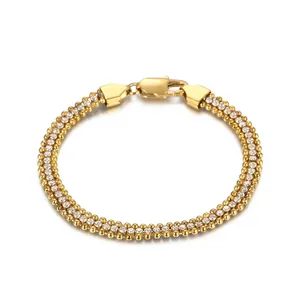 Elegante goudkleurige roestvrijstalen kralenarmband met fonkelende zirkonia-stenen