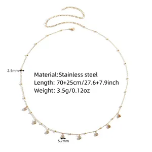 Detailed view of the gold-plated stainless steel body chain with 8 sparkling diamond pendants.