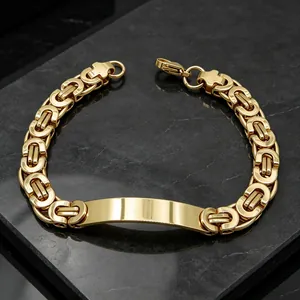 Detailed view of gold-tone Byzantine chain men's bracelet with engravable ID plate.