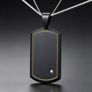Detail view of a matte black titanium steel dog tag pendant with gold border.