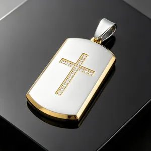 Detailed macro view of a silver and gold titanium steel dog tag pendant with a crystal cross.