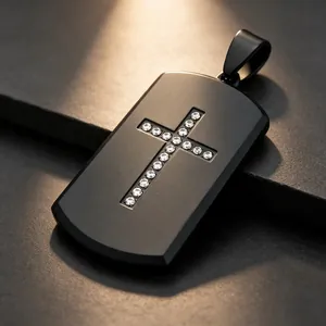 Macro view of black matte dog tag pendant featuring a sparkling cross diamond inlay