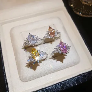 Sparkly marquise-cut zircon rings in four colors presented in a premium jewelry box