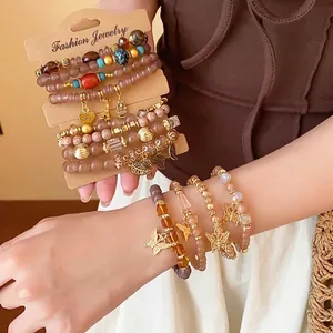 Bohemian multi-layer acrylic beaded bracelet set with gold butterfly and heart charms
