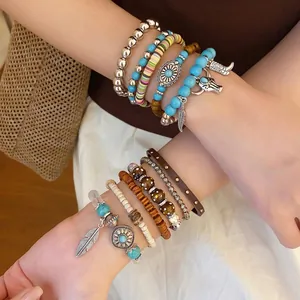 Bohemian multi-layer stacked beaded bracelet set with turquoise and vintage feather charms
