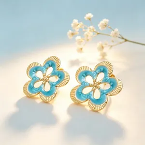 Pendientes de botón vintage franceses de camelia esmaltada calada oro turquesa