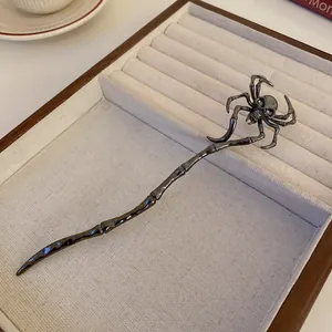 Gothic style spider and skull design hair stick in dark grey metal finish