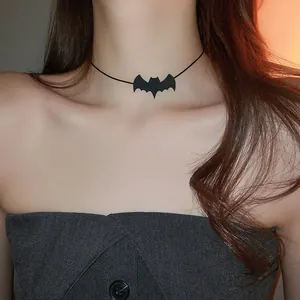 Close-up detail of a stylish black bat choker necklace for Halloween party costume