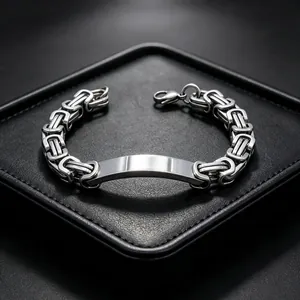 Silver titanium steel Byzantine chain men's bracelet with engravable curved plate detail