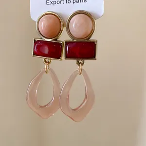 Boucles d'oreilles pendantes géométriques vintage style Maillard en acrylique rouge et pêche