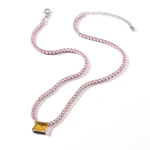 Silver tennis necklace featuring pink round zircons and a yellow emerald-cut gemstone