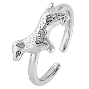 Detailed view of silver-toned adjustable ring featuring a realistic Cocker Spaniel puppy design