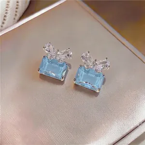 Elegant light blue rectangular zircon earrings with sparkling crystal butterfly accents