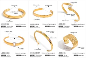 Tabella delle specifiche dettagliate per bracciali aperti in acciaio inossidabile dorato.