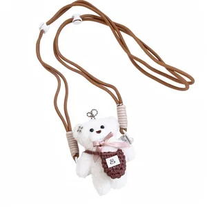 Cute white plush bear pendant with brown woven cord and pink ribbon bow phone charm