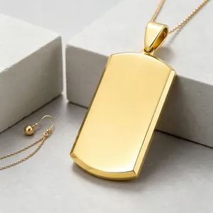 Detailed macro shot of a polished gold titanium steel dog tag pendant with a smooth surface