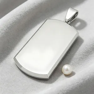 Close-up of a polished stainless steel blank dog tag pendant on velvet background