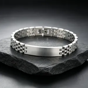 Detailed view of men's titanium steel watch-band style bracelet with engravable ID plate
