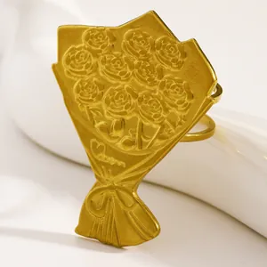Detailed macro view of vintage rose bouquet design on gold stainless steel ring