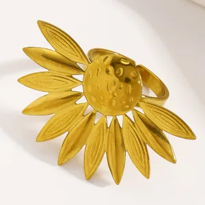 Detail shot of vintage golden stainless steel sunflower design adjustable open ring.