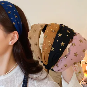 Close-up of fabric star-studded headbands in five versatile colors for a stylish look