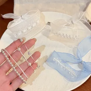 Elegante set di braccialetti coreani con perle e organza per donne, gioielli moda raffinati