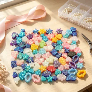 Detail view of colorful resin faux opal heart and star pendants for DIY jewelry