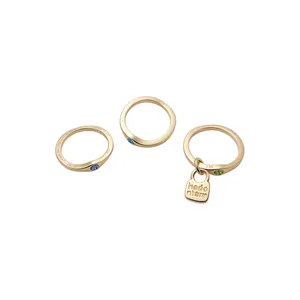 Vintage gold finished ring set featuring colorful crystals and a padlock charm pendant