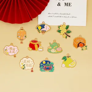 Collection of Mid-Autumn festival enamel charms featuring mooncakes, lanterns and fans.