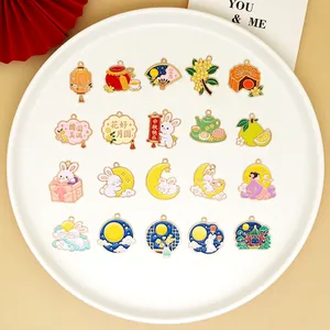Detailed view of various Mid-Autumn Festival themed enamel charms with bunny and moon motifs.